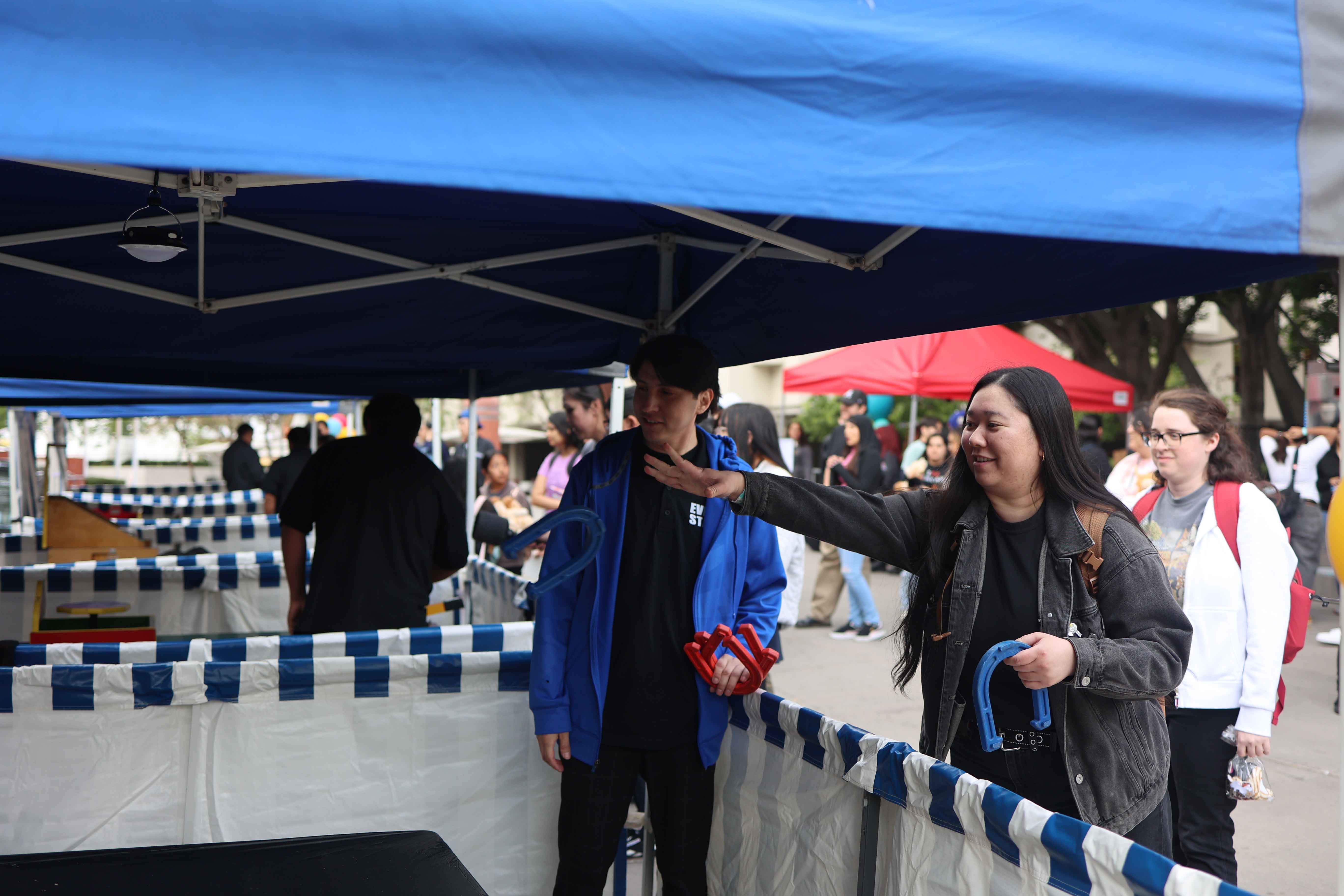 Cal State LA mascot walking with students during Eddie Fest